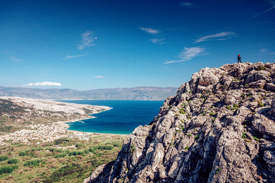 View of the rugged coastline, turquoise waters, and distant islands under a clear blue sky, highlighting the natural beauty, Ba&Aring;&iexcl;ka, Primorje-Gorski Kotar County, Croatia.