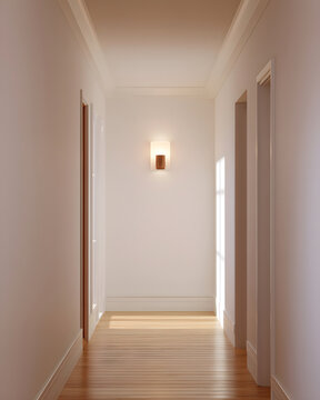 Modern wall sconce on clean hallway wall with left copy space soft ambient lighting interi