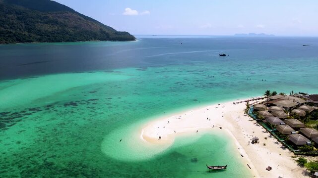 Experience the beauty of Koh Lipe, Thailand, where turquoise waters meet white sandy beaches.