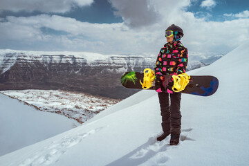 Female Snowboarder Enjoying Winter Vacation