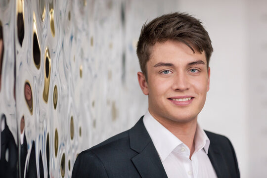 Portrait of smiling young businessman