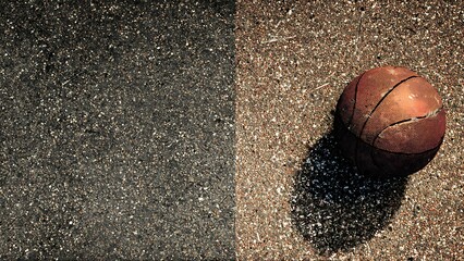 Worn Basketball on Textured Street Court Surface with Shadow Details