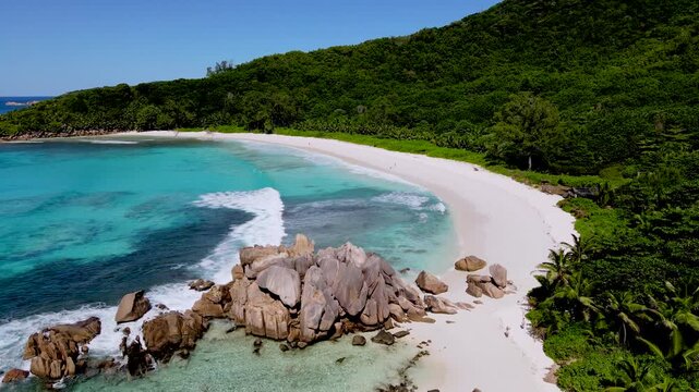 Discover the stunning beauty of Anse Cocos Beach on La Digue Island, Seychelles. Enjoy soft white sands, lush greenery, and vibrant turquoise waters that invite relaxation and exploration.