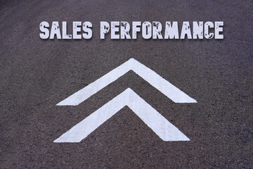 SALES PERFORMANCE concept. word written on a road sign with ascending arrows indicating growth