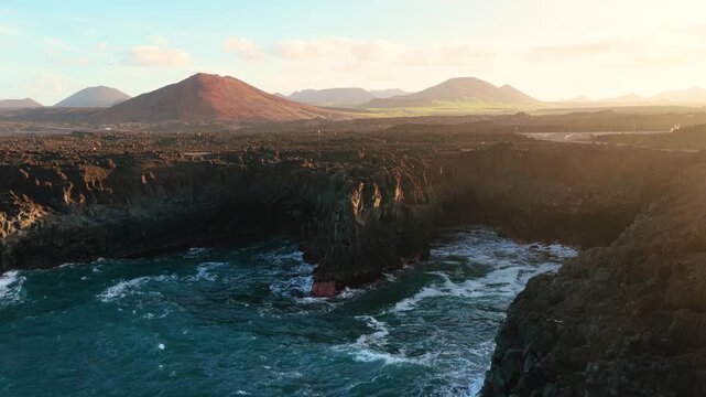 Los Hervideros is a dramatic stretch of volcanic coastline in Yaiza, Lanzarote, where the Atlantic Ocean crashes into sea caves and basaltic cliffs. Formed during the Timanfaya eruptions between 1730 