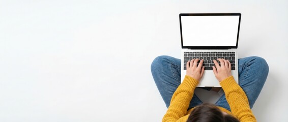 Typing action by a person on a laptop in a minimalistic workspace with a clean white background capturing professional productivity and focused mindset