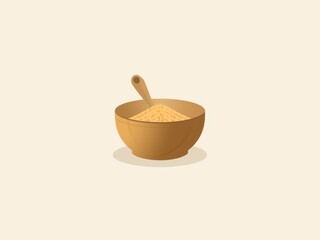 Wooden bowl with wooden spoon filled with yellow powdered substance