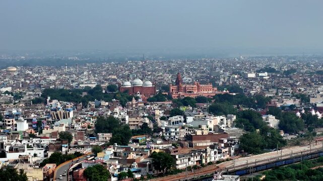 Drone video capturing the Janmasthan temple complex beside Shahi Eidgah Mosque, surrounded by Mathura&rsquo;s tightly packed skyline and timeless pilgrimage atmosphere.