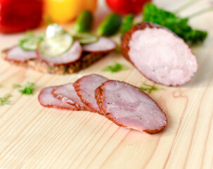 Sliced Smoked Ham on a wooden board