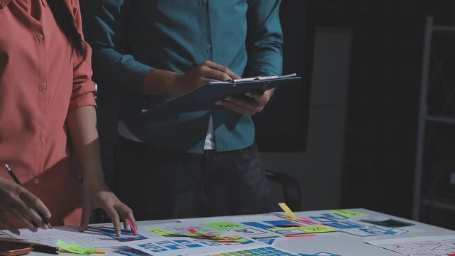 team of UI UX web designer are working together to develop mobile responsive websites. Mobile Mockup