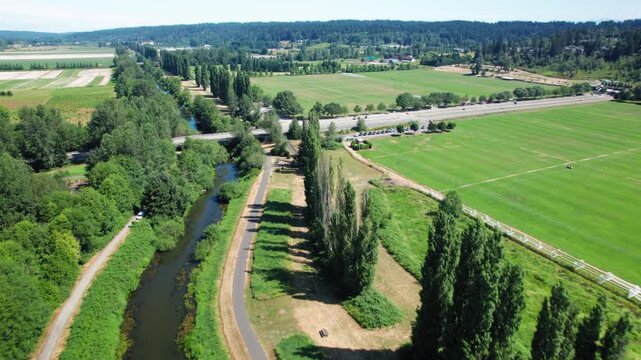 Sunny Aerial Over Green Countryside