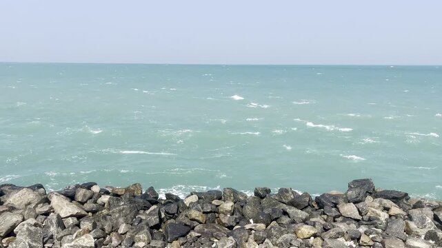 Close up view of sea waves hitting coastal rocks