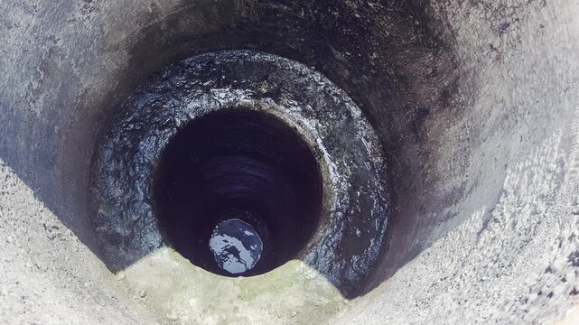 Closer view of a drain well hole - Deeper well between the ocean