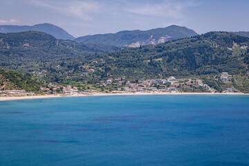 Fototapeta premium Agios Georgios village on Corfu Island, Greece - view from area of Porto Timoni Ionian Sea beach