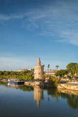 Obraz premium Historic Torre del Oro (Golden Tower) Reflected in the Guadalquivir River, Seville, Spain