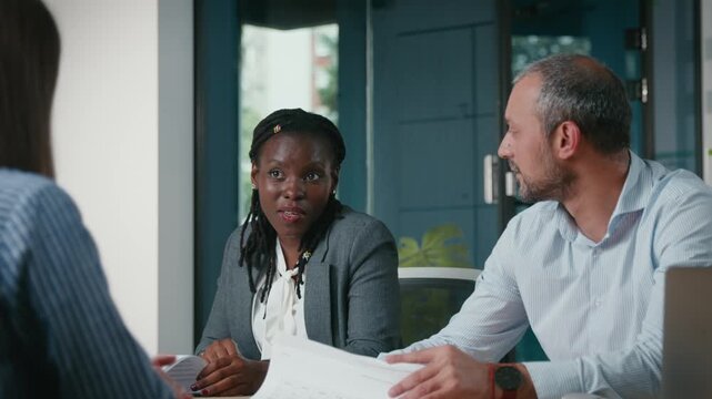 Diverse team collaborating on a business project