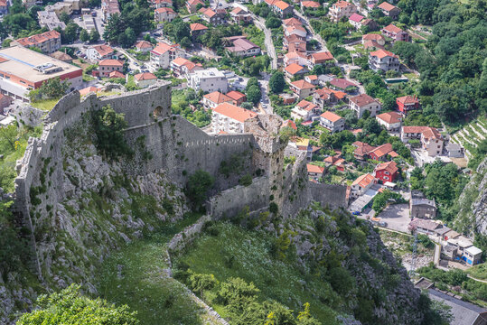 Aerial view from walls of St John Fortress in Kotor with Dobrota town on background, Montenegro