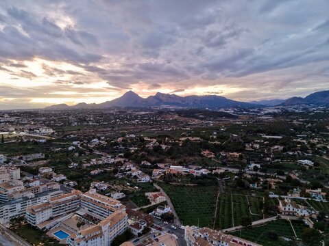 Evening village view, Serene coastal mountain settlement, Tranquil hamlet above tranquil bay