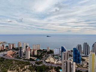 city harbor landscape, coastal urban outlook featuring ships and drifting cloud formations effectively © Nataliia
