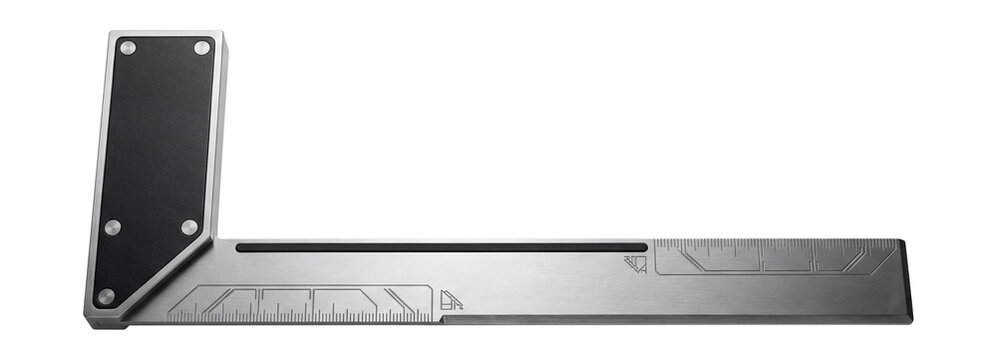 Framing square with a long steel blade and rafter tables.
