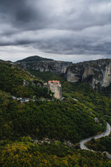 Fototapeta premium Majestic Meteora monasteries on giant sandstone rocks at sunset - Greece