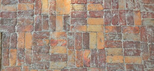 Fototapeta premium Vintage Terracotta Floor with Scattered background in Sunlight.