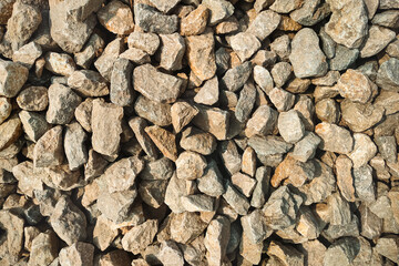 Sunset Gold Gravel, a decorative crushed landscaping stone texture background 