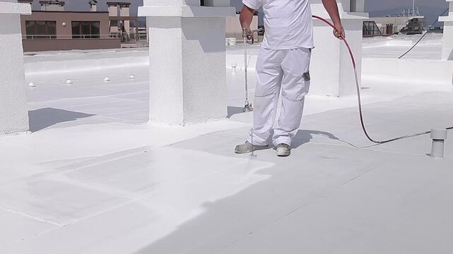 Applying White Reflective Roof Coating for Waterproof Hydroinsulation Protection
