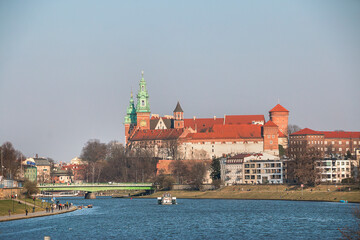 Ancient Wawel Castle on the banks of the Vistula River in Krakow, Poland on a sunny spring day