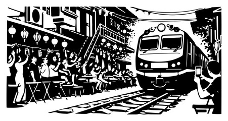 Famous Hanoi train street scene with people sitting at cafes as the locomotive passes in Vietnam © Tomas