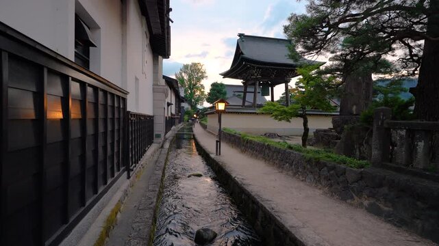 Hida, Gifu, Japan on Shirakabe Dozogai Street at twilight.