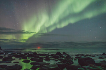 Northern lights - Norway - February arctic night sky with colorful aurora borealis © Cristian Bortes
