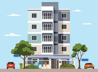 modern five story apartment building with balconies, laundry drying outside, green trees, and cars parked on the street under a clear blue sky. © Flash