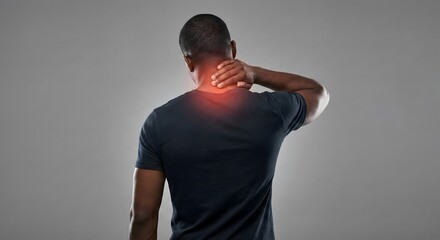 Man with neck pain holding his neck