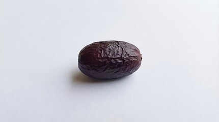 Fototapeta premium Java plum seed jamun fruit pit isolated on white background