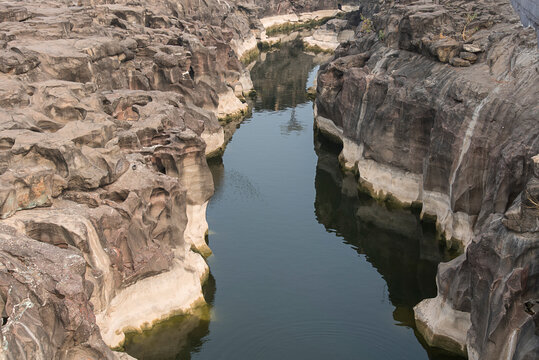 Natural rock cut formations, Potholes, ranjankhalage, the riverbed of the Kukadi River, Nighoj near Pune, Maharashtra, India. 