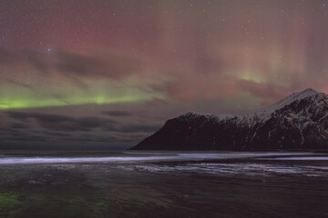 Northern lights - Norway - February arctic night sky with colorful aurora borealis © Cristian Bortes