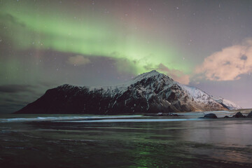 Northern lights - Norway - February arctic night sky with colorful aurora borealis © Cristian Bortes