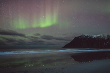 Northern lights - Norway - February arctic night sky with colorful aurora borealis © Cristian Bortes