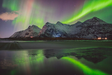 Northern lights - Norway - February arctic night sky with colorful aurora borealis © Cristian Bortes