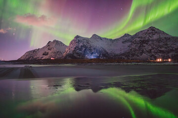 Northern lights - Norway - February arctic night sky with colorful aurora borealis © Cristian Bortes