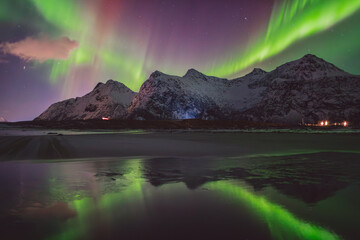 Northern lights - Norway - February arctic night sky with colorful aurora borealis © Cristian Bortes