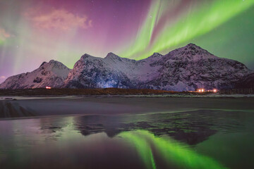 Northern lights - Norway - February arctic night sky with colorful aurora borealis © Cristian Bortes