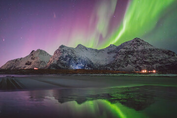 Northern lights - Norway - February arctic night sky with colorful aurora borealis © Cristian Bortes