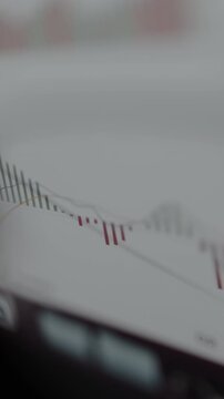 Financial chart indicating the amount of selling volume and buying volume, view through vision glasses