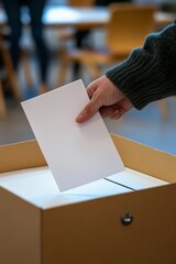 Person places a white envelope into a ballot box at a voting station during an election
