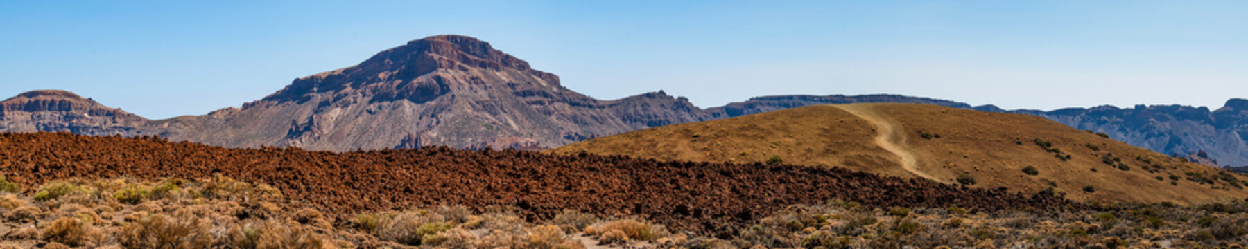 Tenerife, Canary Islands, Spain, Europe: panoramic view of the mountains and desert volcanic landscape hiking in the Teide National Park (Parque nacional del Teide)