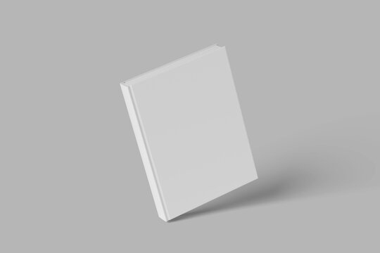 Hard cover book mock up isolated on soft gray background.