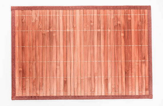 Bamboo dish stand for setting the table on white background.