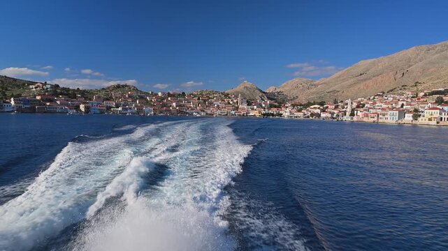 Ferry Wake Moving Away From Chalki Town, Greece